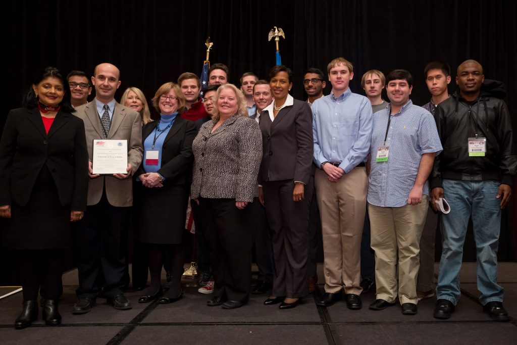 UT Dallas faculty and scholarship students are on hand to receive the
CyberCorps Scholarship for Service award certificate in Washington, DC in January 2015.